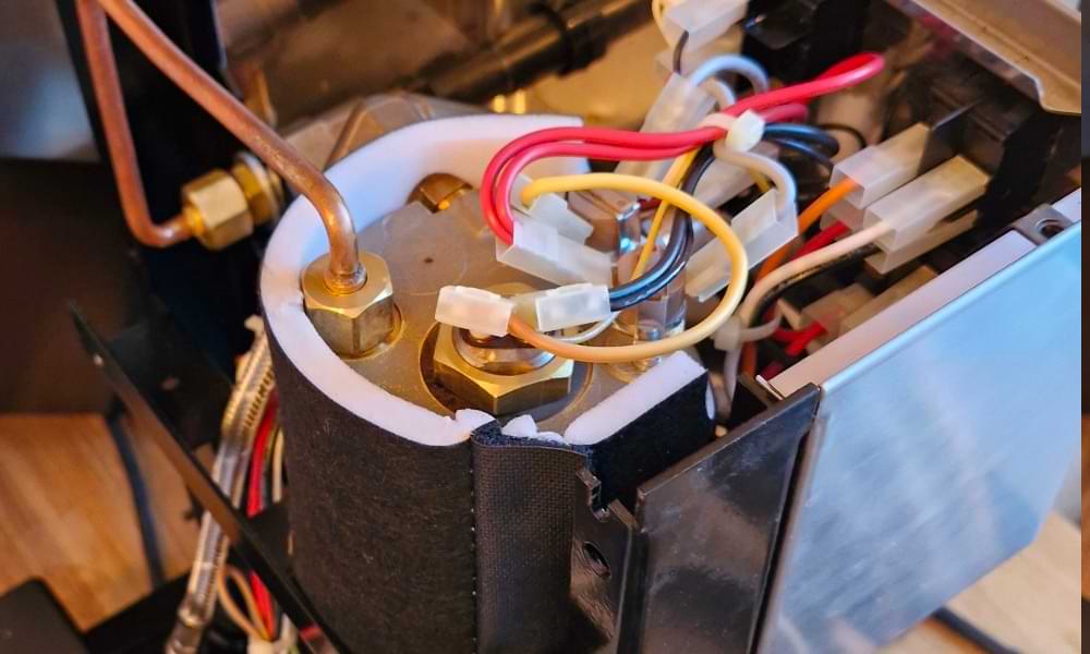 Close-up image of the boiler inside a Rancilio Silva